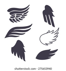 Set of Six Vector Silhouettes Wings. Elements for Logos, Tattoos, Labels and Badges Designs. 