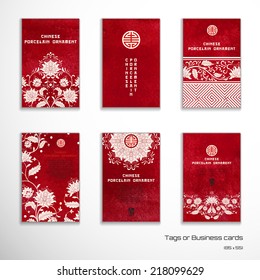 Set of six vertical business cards or tags. Beautiful flowers and red watercolor background. Hand drawing. Imitation of chinese porcelain painting. Place for your text.