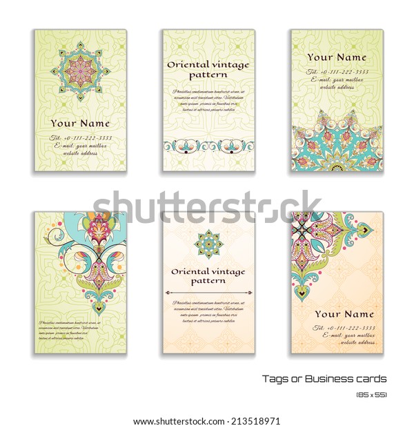 Set of\
six vertical business cards or tags. Oriental floral pattern.\
Simple delicate ornament. Place for your text.\

