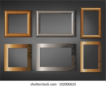 Set of six wooden photo frames on wall