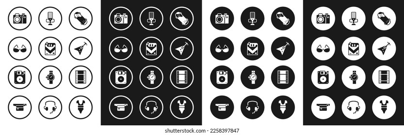 Set Skateboard trick, Cigarettes pack box, Glasses, Photo camera, Electric bass guitar, Microphone, Play Video and Floppy disk icon. Vector