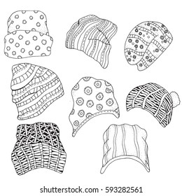 Set of sketches. Warm clothes,  hats. Hand-drawn vector illustration. Coloring book page for adult.