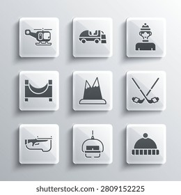 Set Ski lift, Winter hat, Ice hockey sticks, Mountains, Biathlon rifle, Skate park, Rescue helicopter and athlete icon. Vector