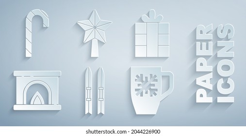 Set Ski and sticks, Gift box, Interior fireplace, Coffee cup with snowflake, Christmas star and candy cane icon. Vector