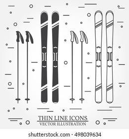 Set of skiing equipment silhouette icons. Set include skis and ski poles . Winter equipment icons for family vacation, activity or travel. For logo design, patches, seal, logo or badges. 