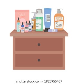 set of skincare icons on a furniture with two drawers vector illustration design