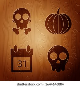 Set Skull , Skull on crossbones , Calendar with Halloween date 31 october  and Pumpkin  on wooden background. Vector