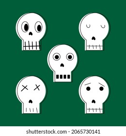 A set of skulls with different expressions. Halloween vector illustration on green background.