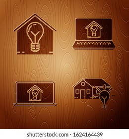Set Smart house and light bulb, Smart house and light bulb, Laptop with smart house and light bulb and Laptop with smart house and light bulb on wooden background. Vector
