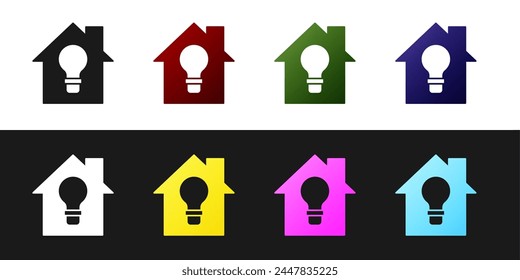 Set Smart house and light bulb icon isolated on black and white background.  Vector