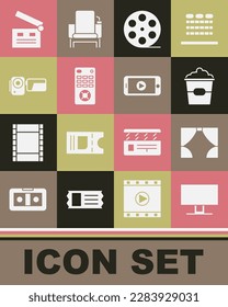 Set Smart Tv, Curtain, Popcorn box, Film reel, Remote control, Cinema camera, Movie clapper and Online play video icon. Vector