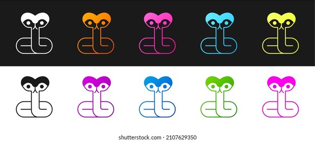 Set Snake icon isolated on black and white background.  Vector