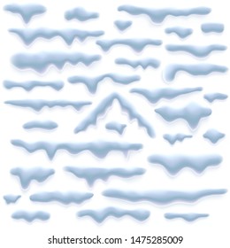 Set of snow caps, icicles, and snowdrift isolated on white background. Winter decorations. Elements for computer games, Christmas greeting cards. EPS 10