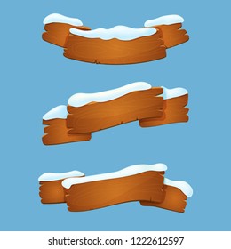 Set of snow covered old wooden banners, ribbons covered with snow on blue background. Vector icons. Winter season signs.