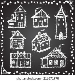 Set of snowbound chalk painted houses with ornament element. Winter theme