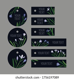 set snowdrops on a dark background: 
three round tags and six stripe tags 