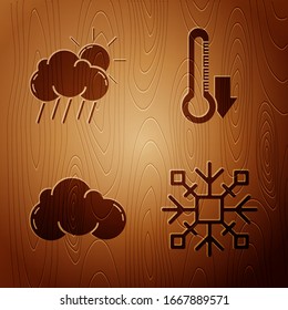 Set Snowflake, Cloud with rain and sun, Cloud and Thermometer on wooden background. Vector