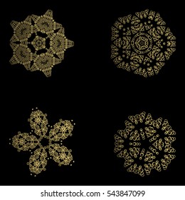  Set of snowflake for the new year. Collection of linear round figures, as the vintage ornament. Gold radial objects on the black background in vector. Decoration for christmas