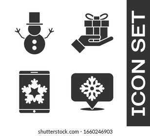 Set Snowflake with speech bubble, Christmas snowman, Christmas on smartphone and snowflake and Gift box in hand icon. Vector