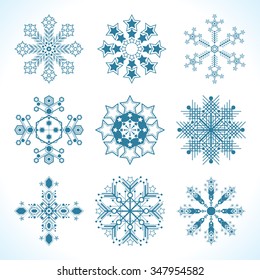 set of snowflakes of different shapes, complex patterns, snowy winter