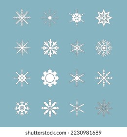 Conjunto de copos de nieve con diferentes formas sobre un fondo azul