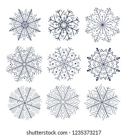 Set of snowflakes doodle icon. Hand drawn vector illustration