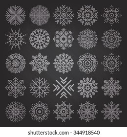 Set of snowflakes . Drawing with chalk. Black and white illustration of snowflakes.