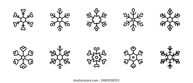 Conjunto de iconos de copos de nieve en estilo lineal.
