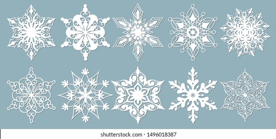 Set of snowflakes. Laser cut pattern for christmas paper cards, design elements, scrapbooking. Vector illustration.