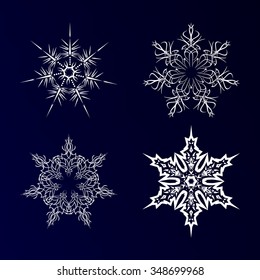  Set of snowflakes for the new year. Set of linear round figures, as the rays of the sun. Blue radial objects on the dark blue background in vector. 