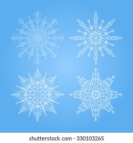 set of snowflakes on a blue background