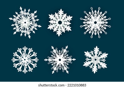 Conjunto de copos de nieve sobre un fondo oscuro. Elemento decorativo para las vacaciones, para Navidad o Año Nuevo
