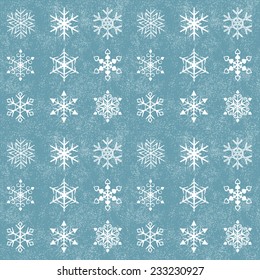 Set of snowflakes on a grunge background (9 different snowflakes) . It's also a seamless pattern.