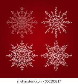 set of snowflakes on a red background