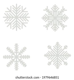 Set of snowflakes with ornate rays, abstract frosty snowflakes of rounded shape in gentle gray color vector illustration