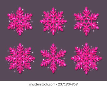 Set of snowflakes. Pink glitter texture. Christmas decoration. Shining pink snowflakes on a gray background.