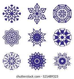 A set of snowflakes. Vector illustration. 9 snowflakes for home decoration for New Year holidays. Ice crystals. Christmas decoration.