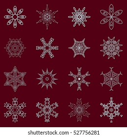 A set of snowflakes. Vector illustration. Snowflakes for home decoration for New Year holidays. Ice crystals. Christmas decoration on a red background.