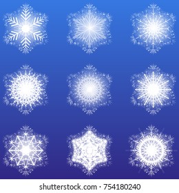 A set of snowflakes. White snowflakes on a blue background - elements for design and advertising. A set of snowflakes for winter design.