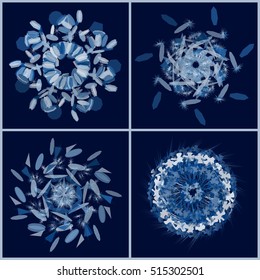 Set of snowflakes. Winter mandala, kaleidoscope. Geometrical symmetrical illustration in blue colors. Circle ornaments on dark background. Ethnic motif. 
