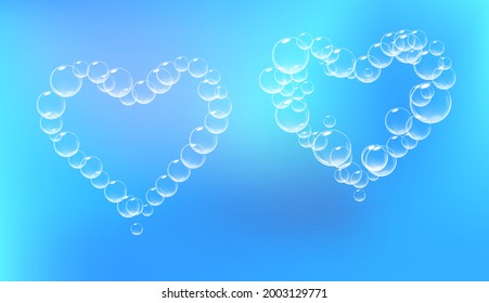 Set of soap foam pieces shaped as heart. Vector realistic soap suds. Valentine day symbol. Blue background.