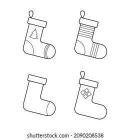 Set of socks for christmas. Vector linear illustration of new year socks for coloring or logo picture. Decoration christmas fireplace icon. 