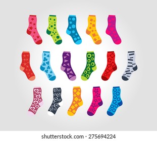 set of of socks with different patterns motives on light background
