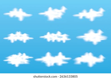 Set of soft white cloud shapes on blue sky background.