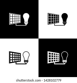 Set Solar energy panel and light bulb icons isolated on black and white background. Vector Illustration