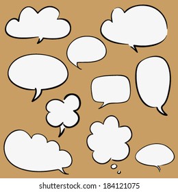 Set of some cartoon hand drawn speaking bubbles, contoured white and black, isolated design objects