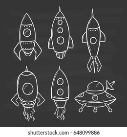 set of space rockets using hand drawing style on chalkboard background