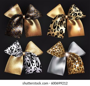 Set of sparkling bows with wild animals skin print. Vector illustration