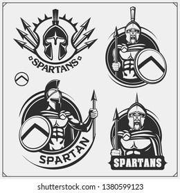 Set of spartans emblems and labels. Sport club design elements and templates. Ancient warriors, spartan spirit, gladiator helmets.