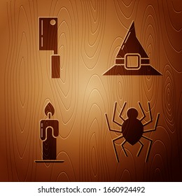 Set Spider , Meat chopper , Burning candle  and Witch hat  on wooden background. Vector